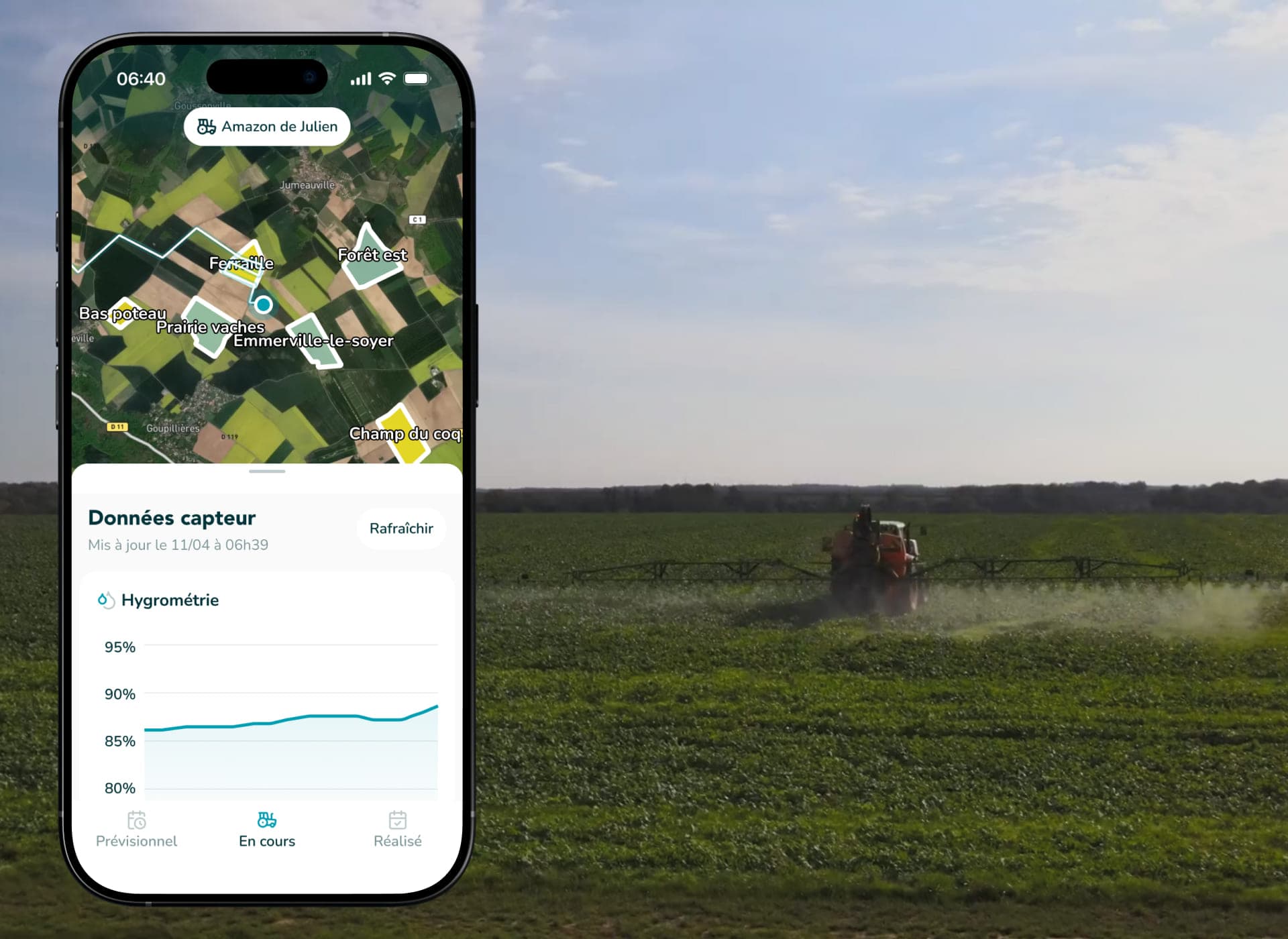 The field map and sensor readout beside a sprayer working the crop.
